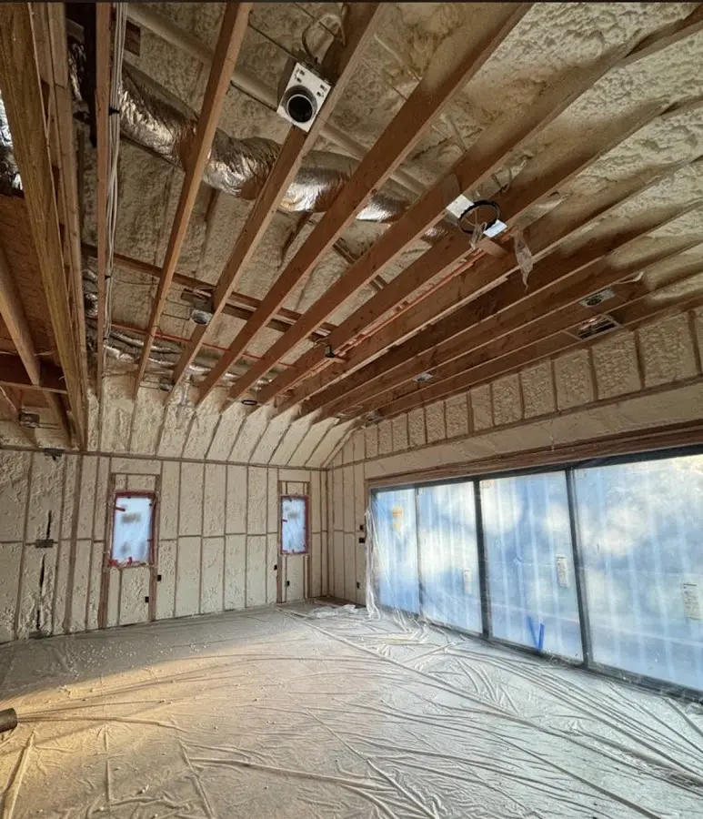 Interior walls and ceiling insulated with spray foam during new construction in Montague